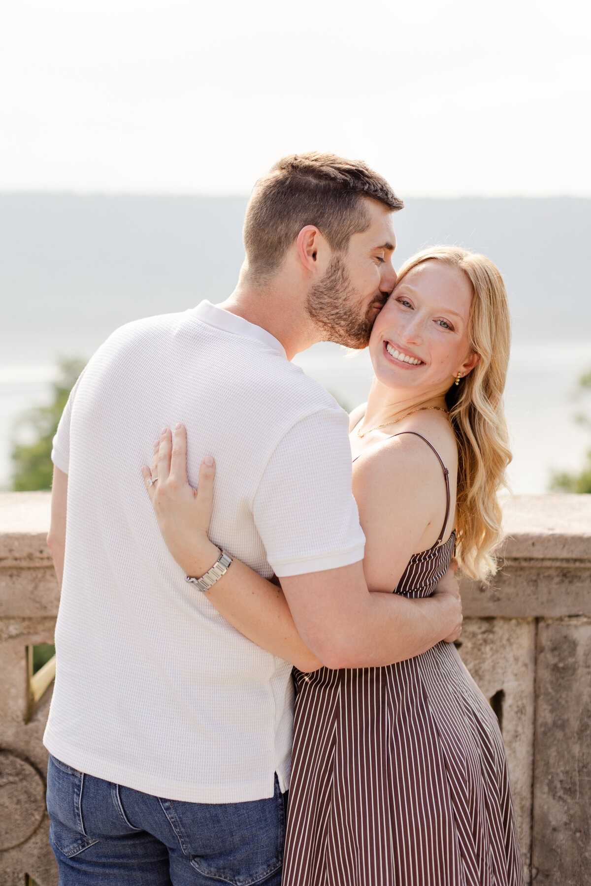 guy-kissing-fiance-keep-during-Yonkers-NY-engagment-session