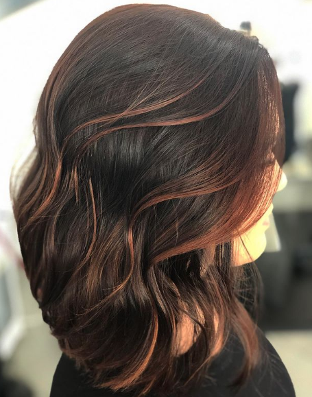 Brunette hair with red highlights