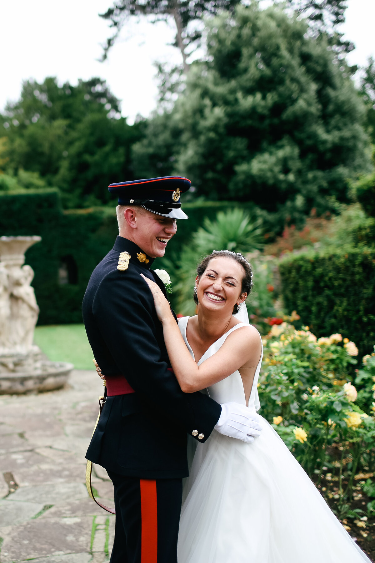 bride-and-groom-laughing-at-military-wedding