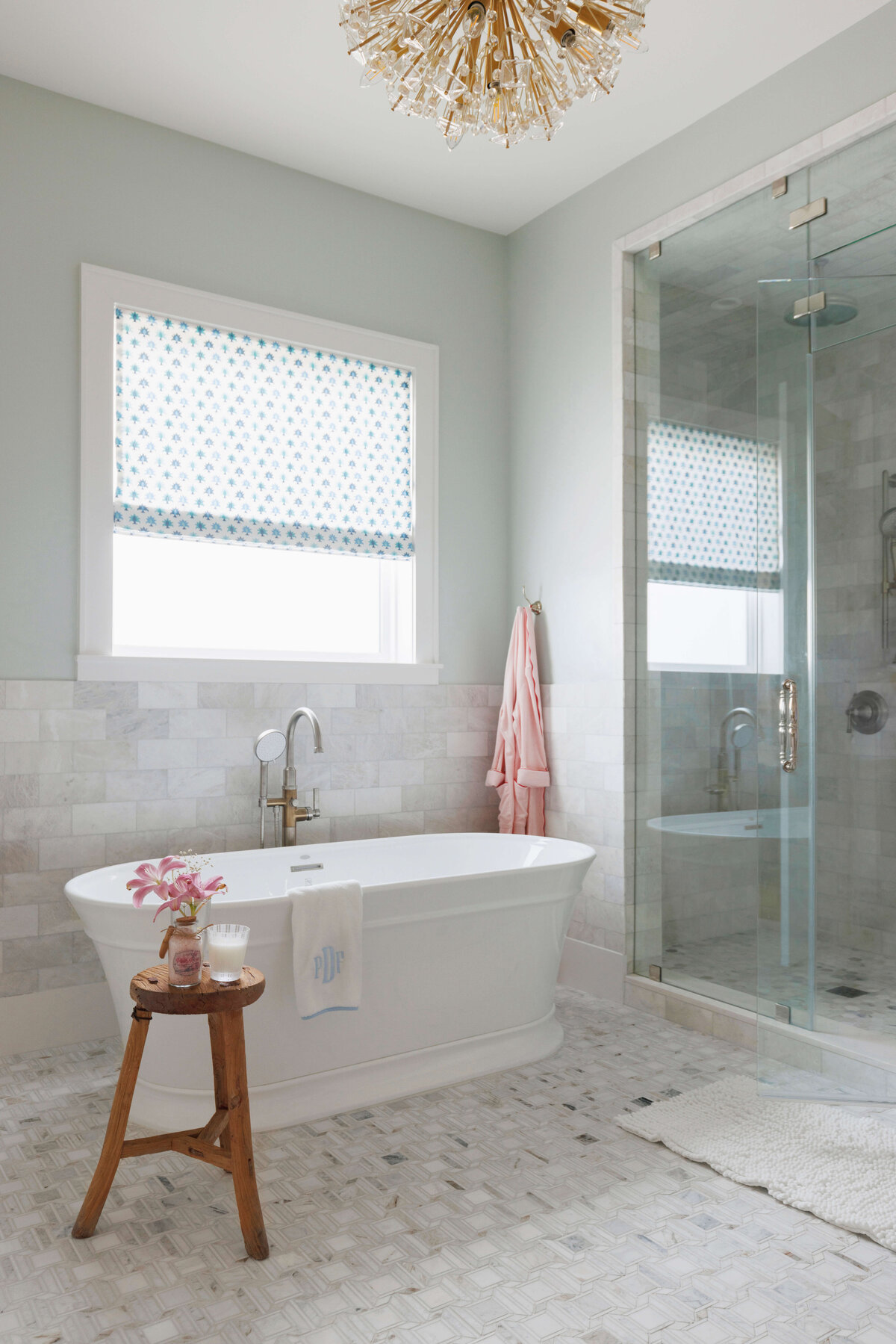 oyster creek studios lighthouse on the lake white free standing bathtub on ceramic tile floor in bathroom