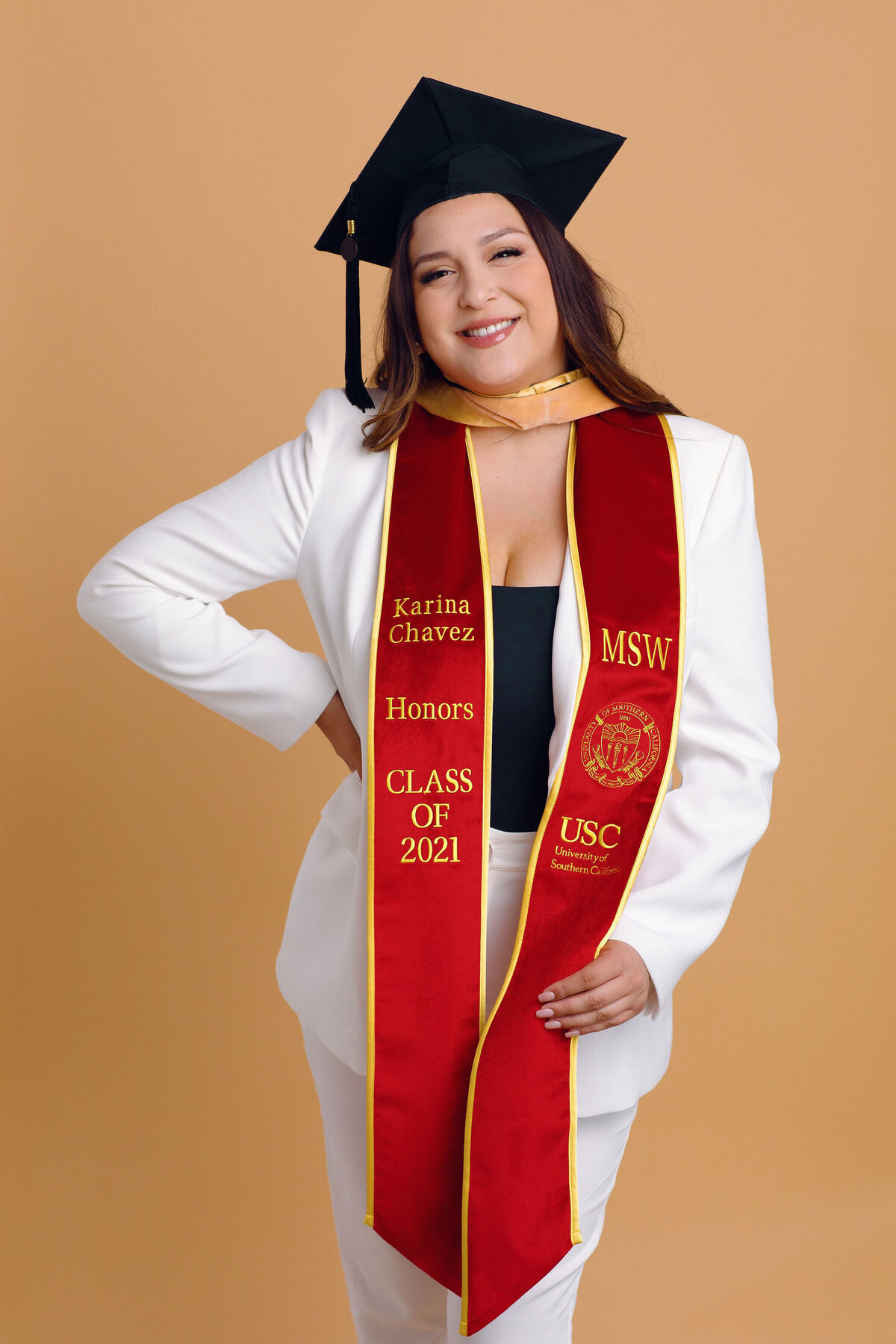 Graduation Portrait Of Young Woman In White Suit And Black Tube Los Angeles