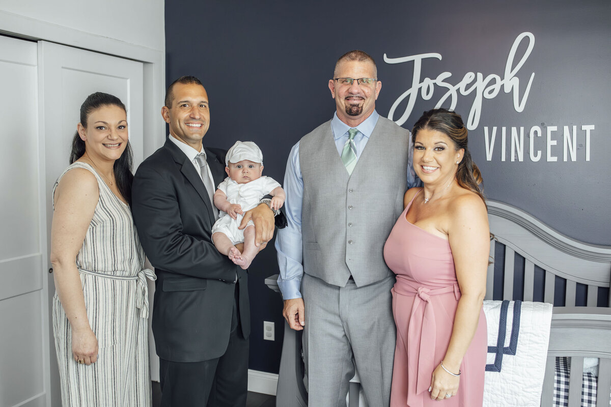 Baptism Photographer | Baby’s baptism with family gathered in church | Ocean County, New Jersey