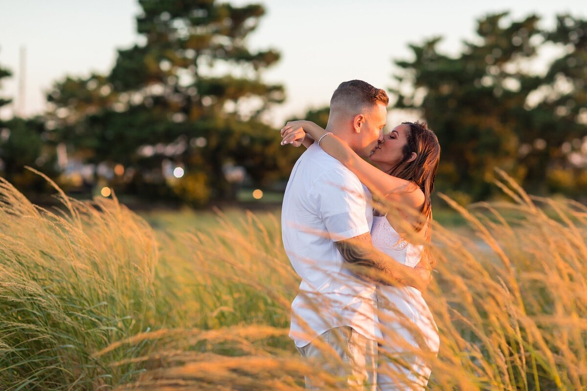 engaged-couple-kissing-lavelette