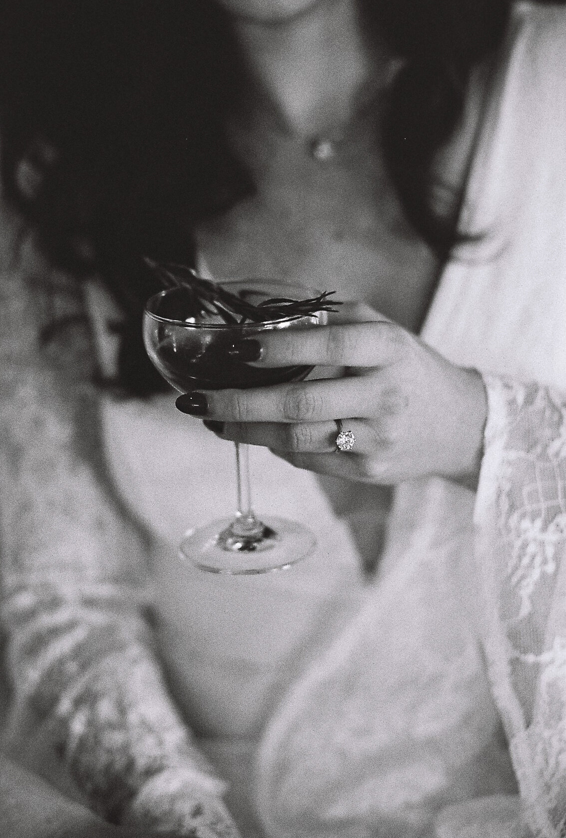 bride holding cocktail