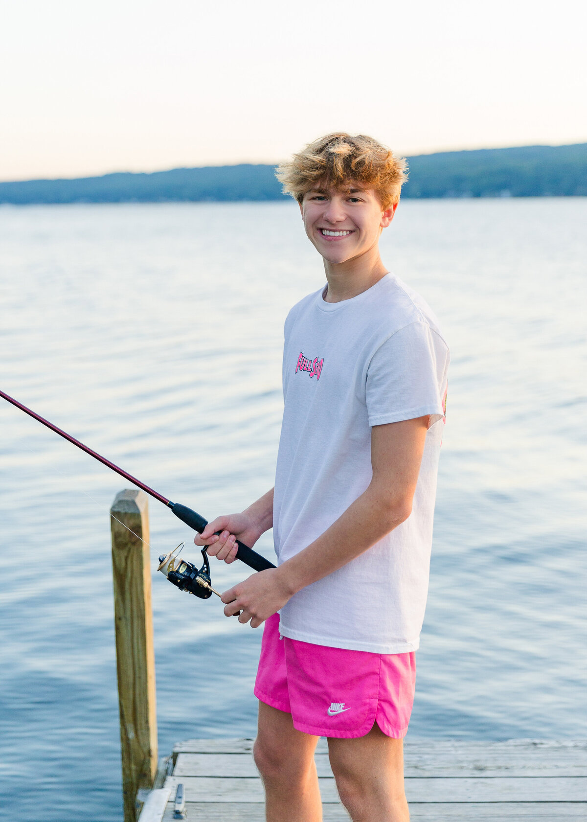 boy senior pictures penn yan fishing on keuka lake