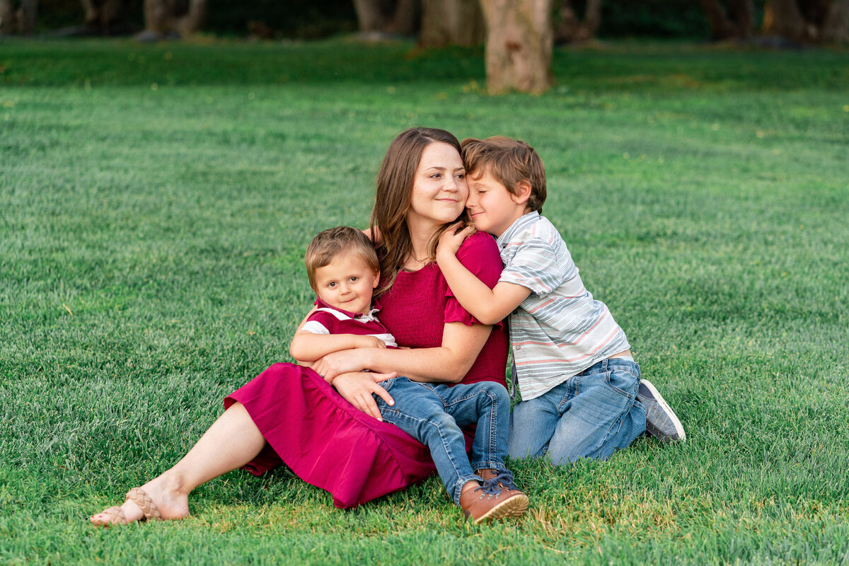 Austin Texas Family photo of mom and sons in a field.
