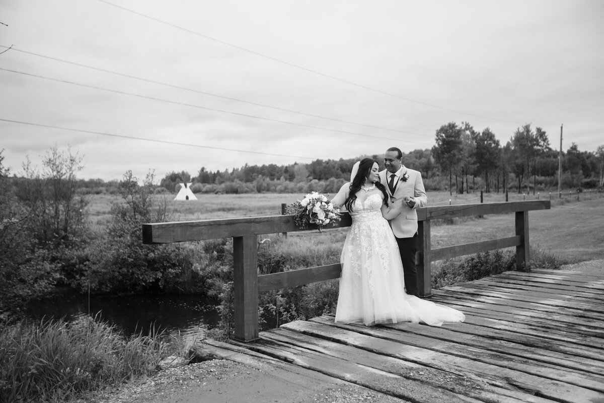 wedding couple wood bridge acres