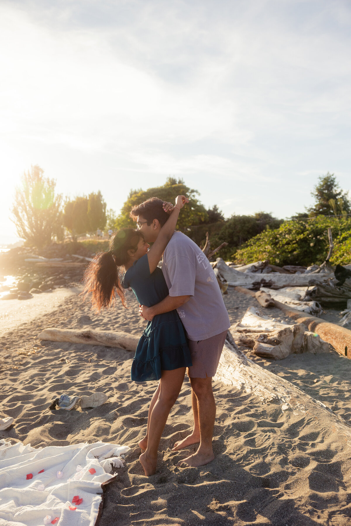 Couple embracing at Myrtle Beach after a private proposal