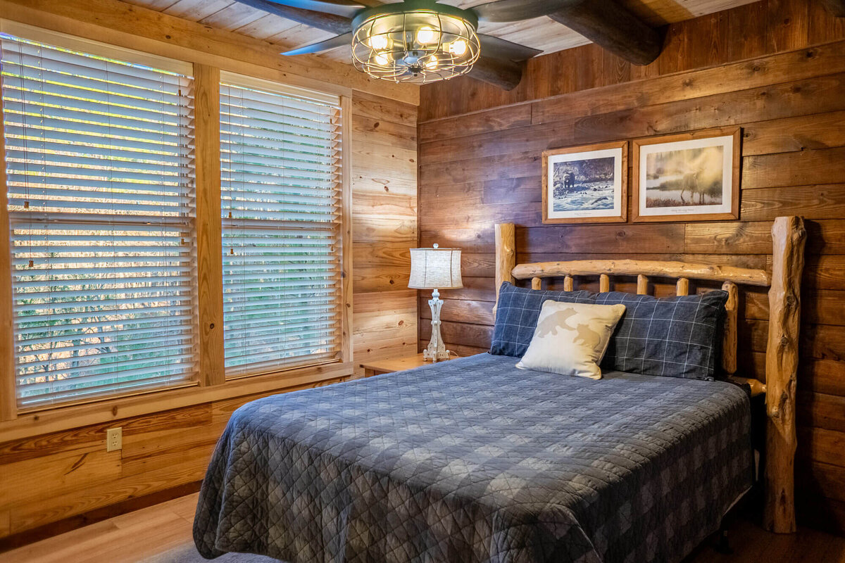Cozy cabin bedroom in luxury designer cabin near Wolf Pen Gap