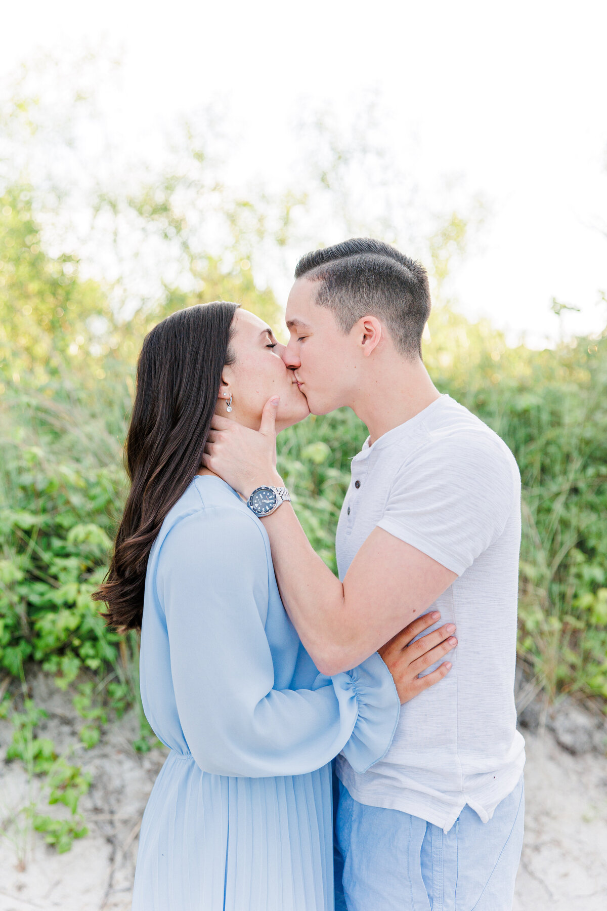Couple kissing during Gloucester, MA engagement photos