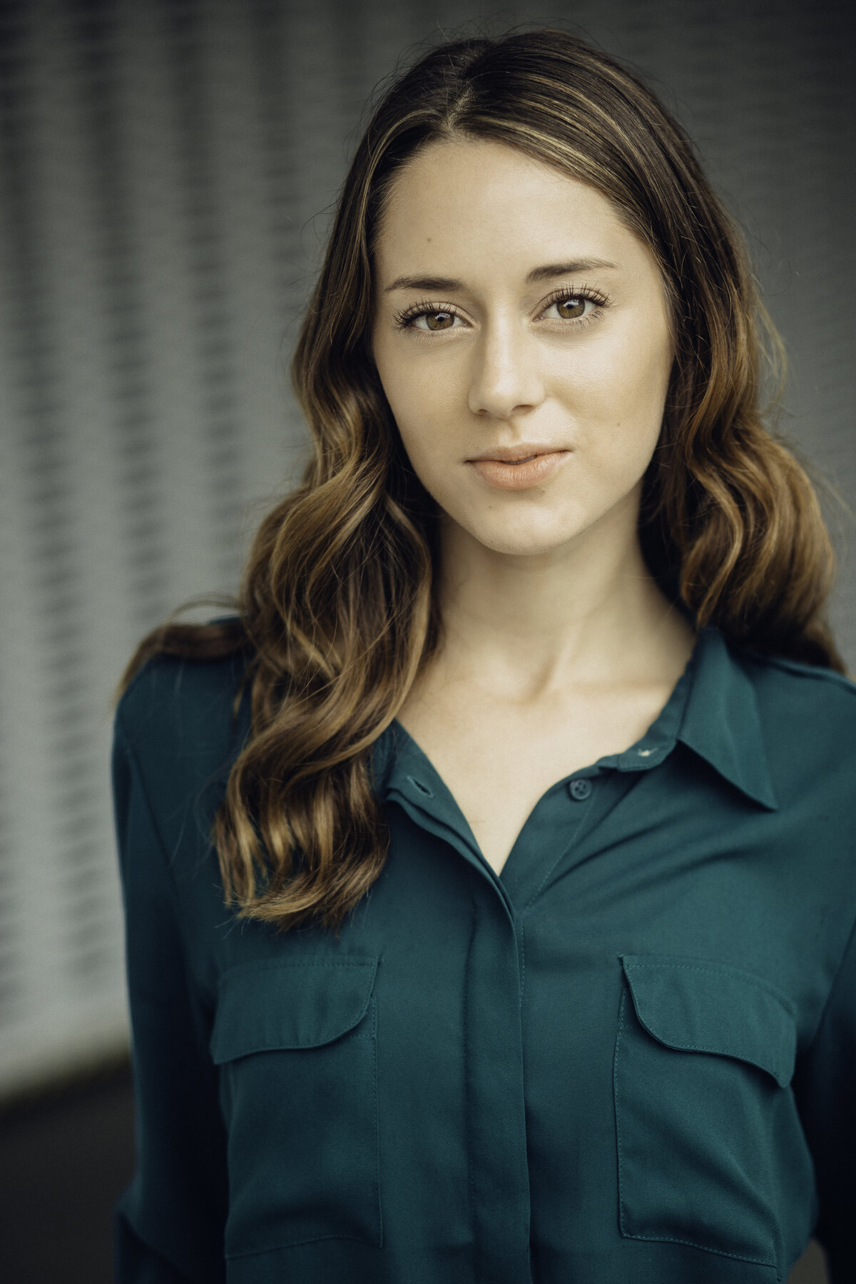 Headshot Photograph Of Young Woman In Blue Green Long Sleeves Los Angeles