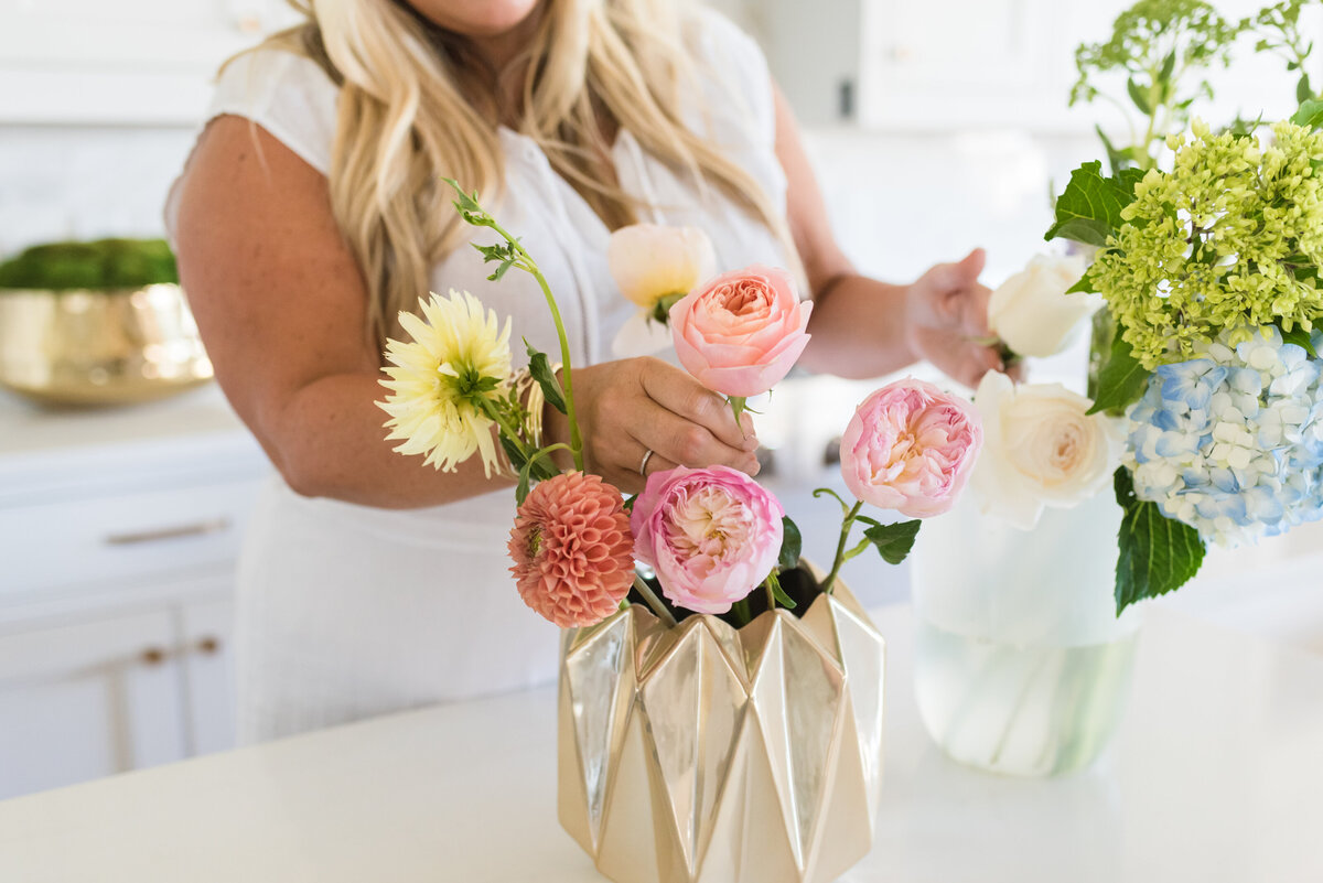 real estate agent arranging flowers