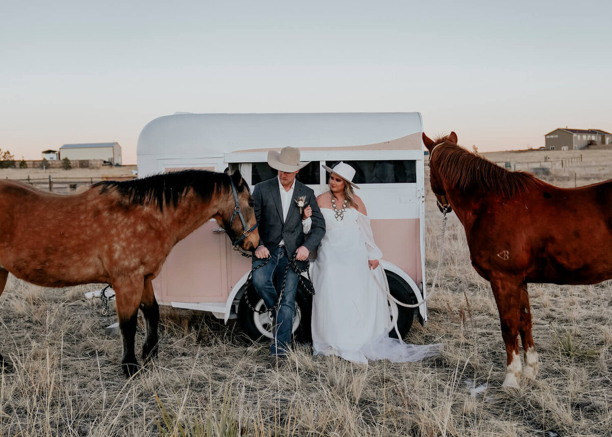 wedding photography denver colorado - couple standin by horses