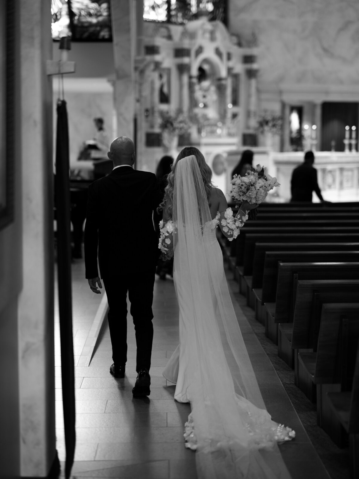 bride walking down the aisle at a church in Southern Calfornia