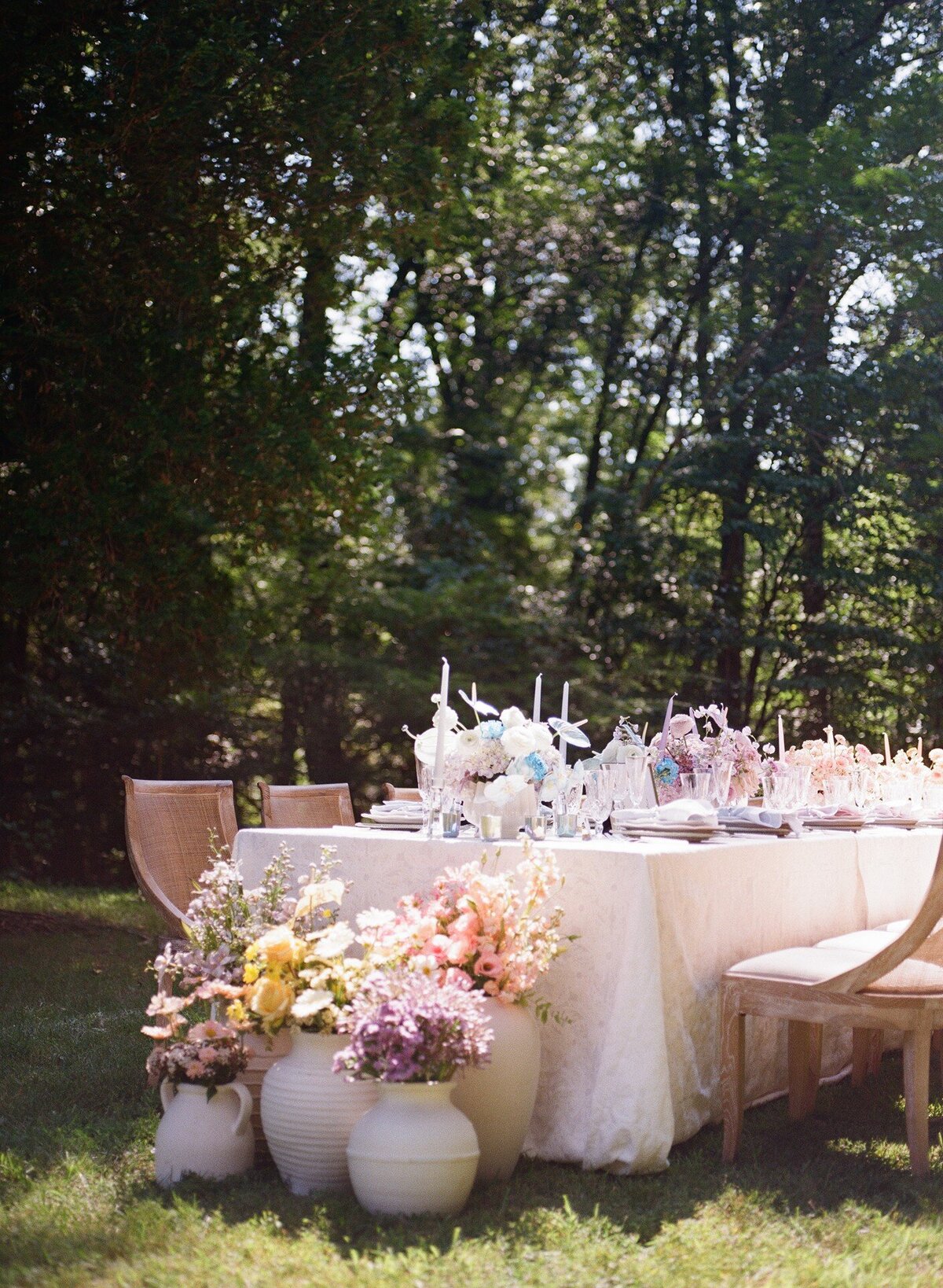 Rainbow florals as table centerpeices at a Strong Mansion wedding in Maryland