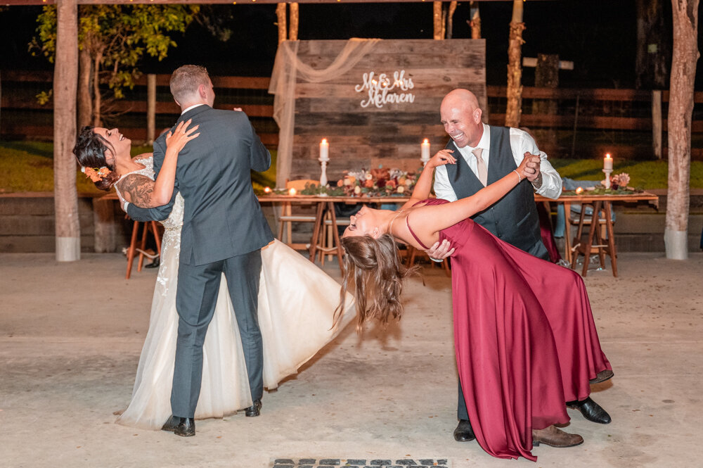 bride and groom dancing at their country themed wedding reception - Townsville Wedding Photography by Jamie Simmons