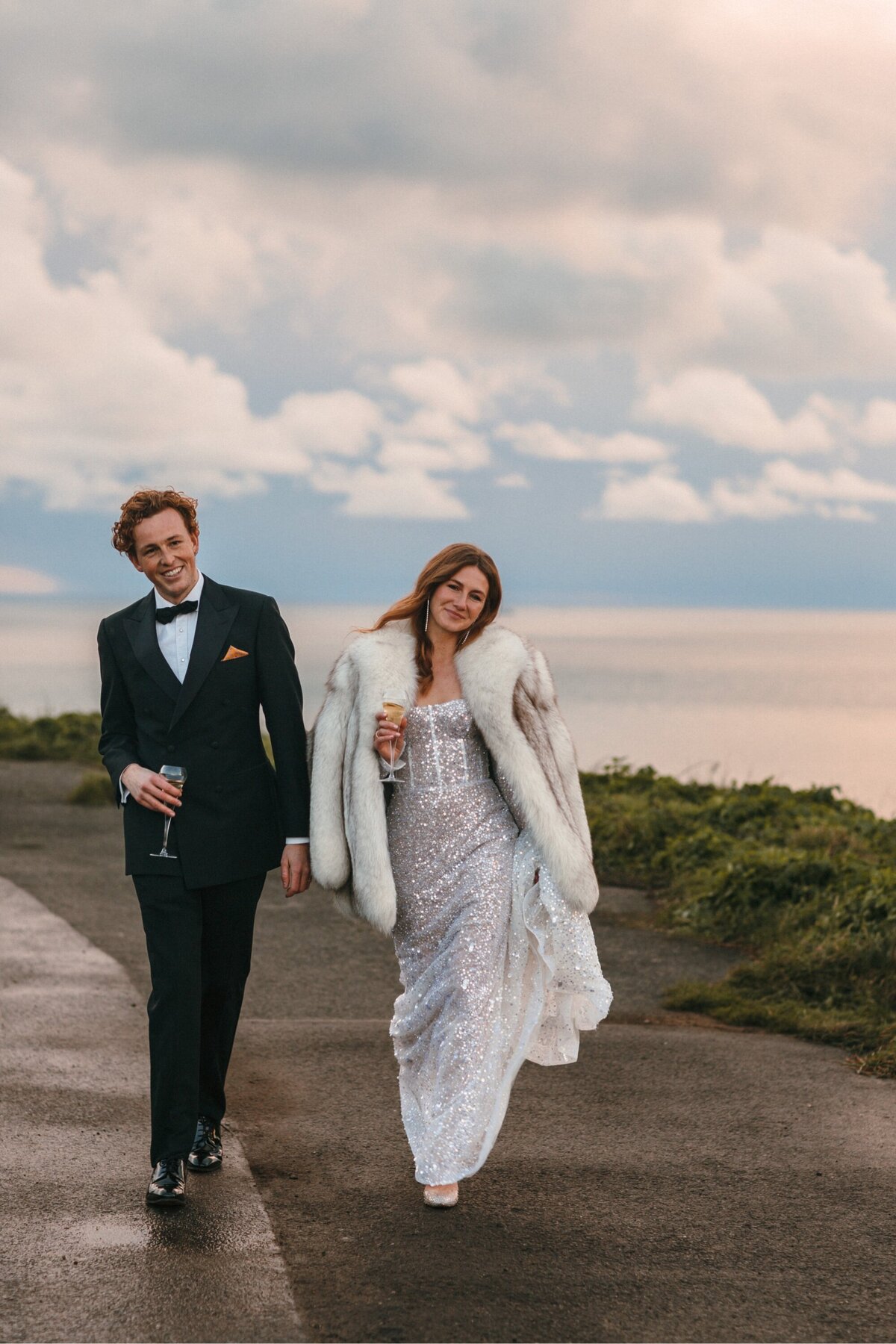 Bride and groom shots by the sea in winter 