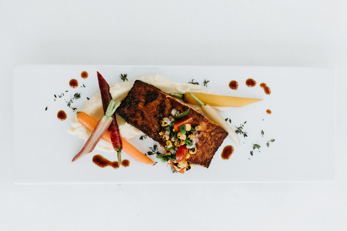 cedar plank salmon with fresh corn salsa served at Willowbrook wedding venue