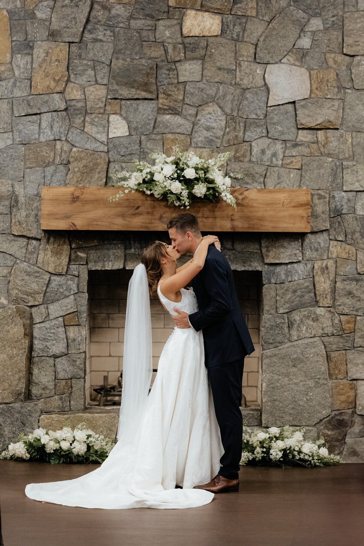 Emotional ceremony surrounded by greenery and fog in the Adirondack Mountains