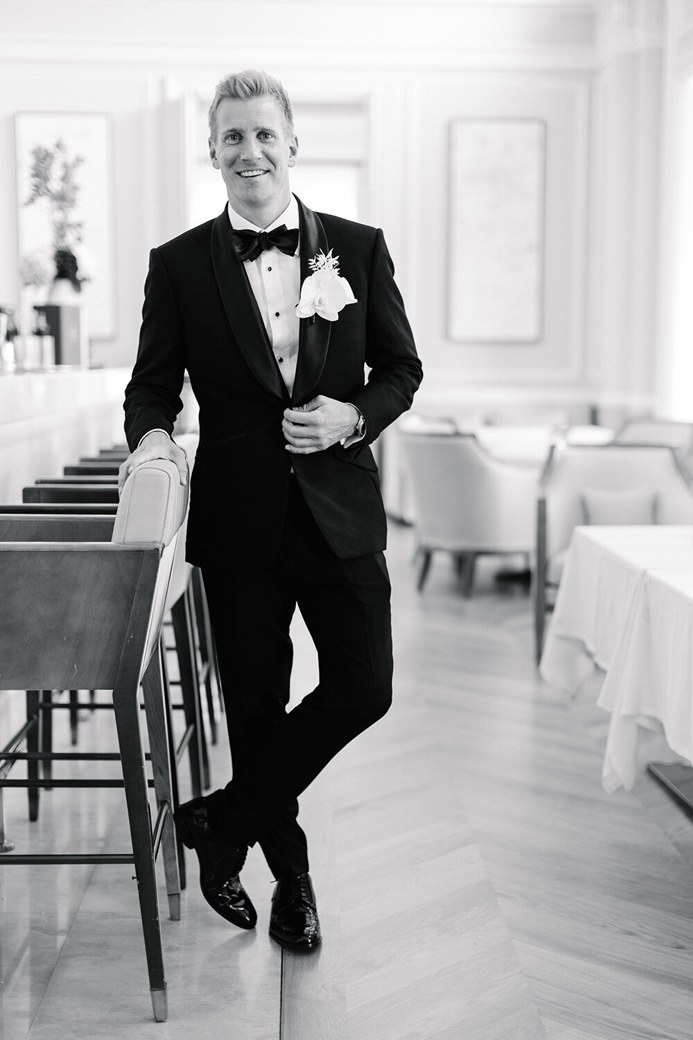 black and white portrait of groom at grand hotel du cap ferrat