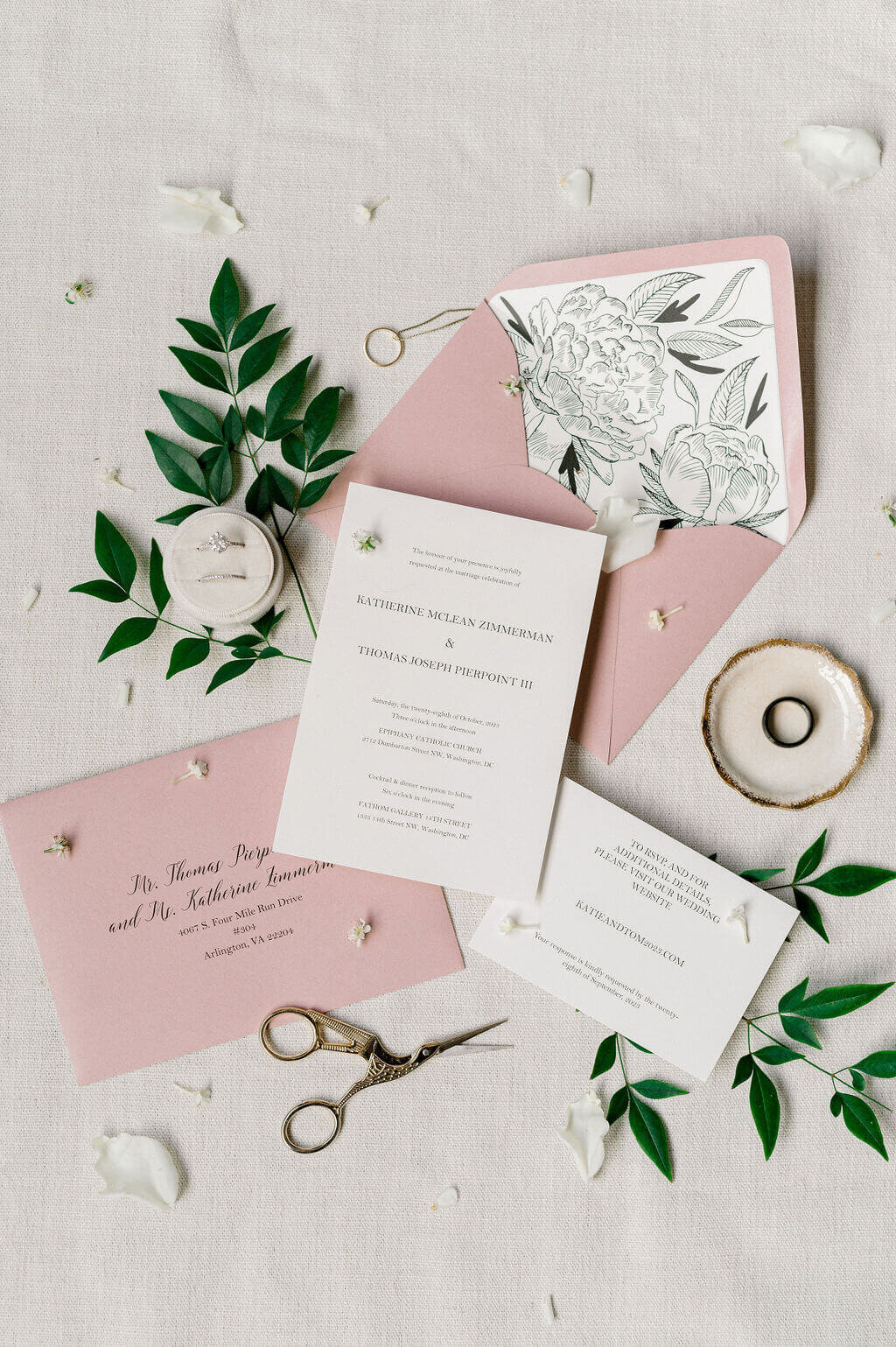 Pink and white invitation suite set up for detail photos and captured by a DMV wedding photographer