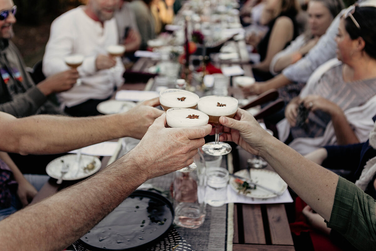 guests cheering their glasses