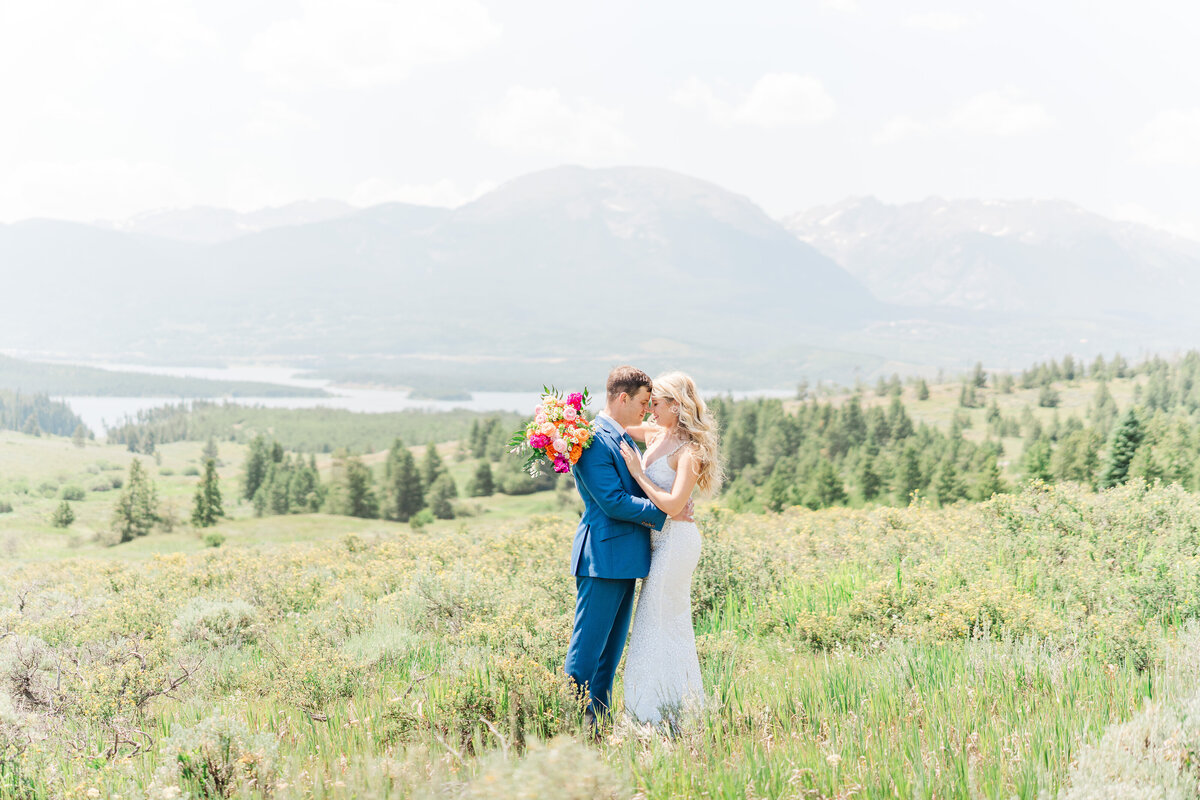 Lake Dillion Reservoir Colorado Elopement Wedding Mountain View Summer Pink and Orange Florals Sparkly Dress Light and Airy Elena Spraguer Photography0048