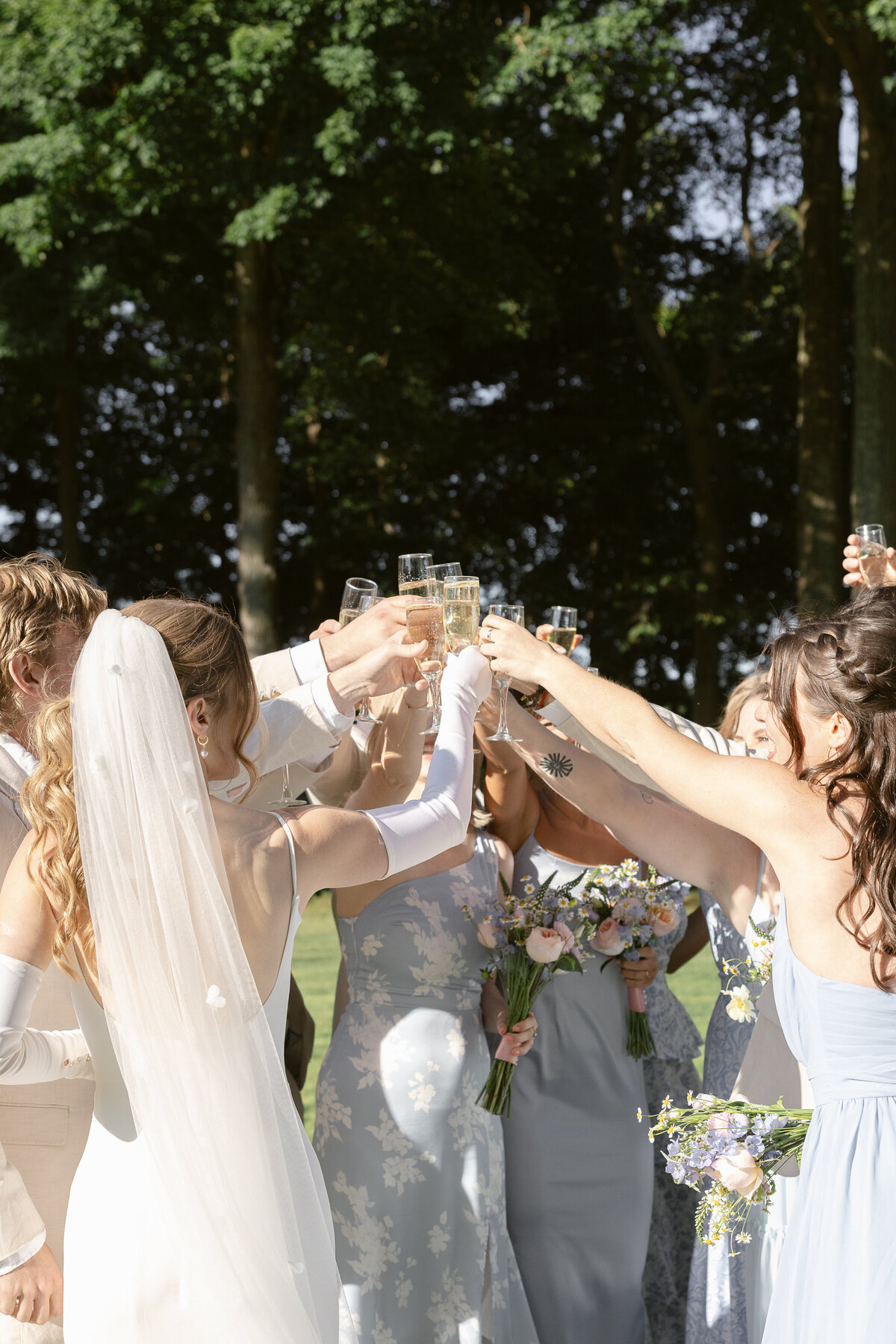 just-married-champagne-toast-with-bridal-party-at-saint-clements-castle