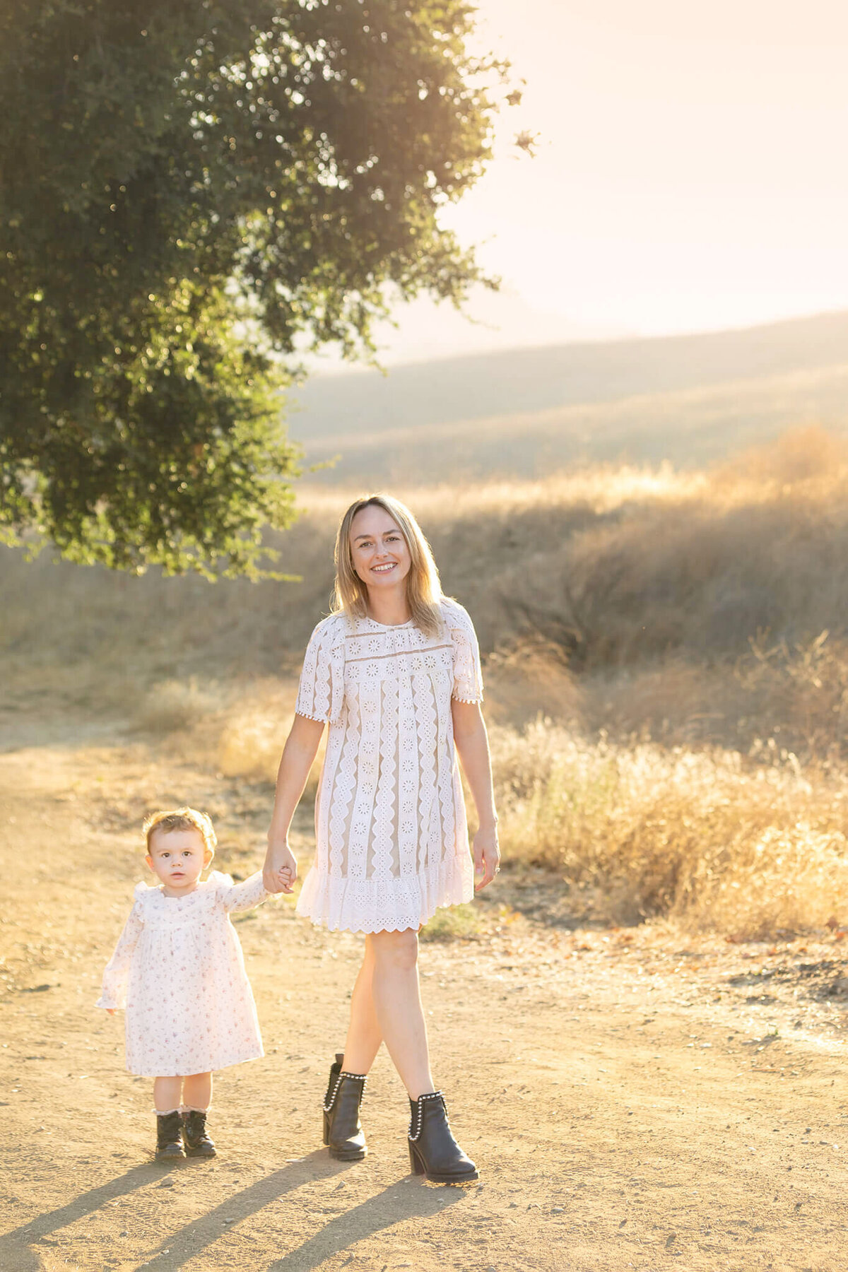 Mom and toddler daughter photographed at sunset by Elsie Rose Photography