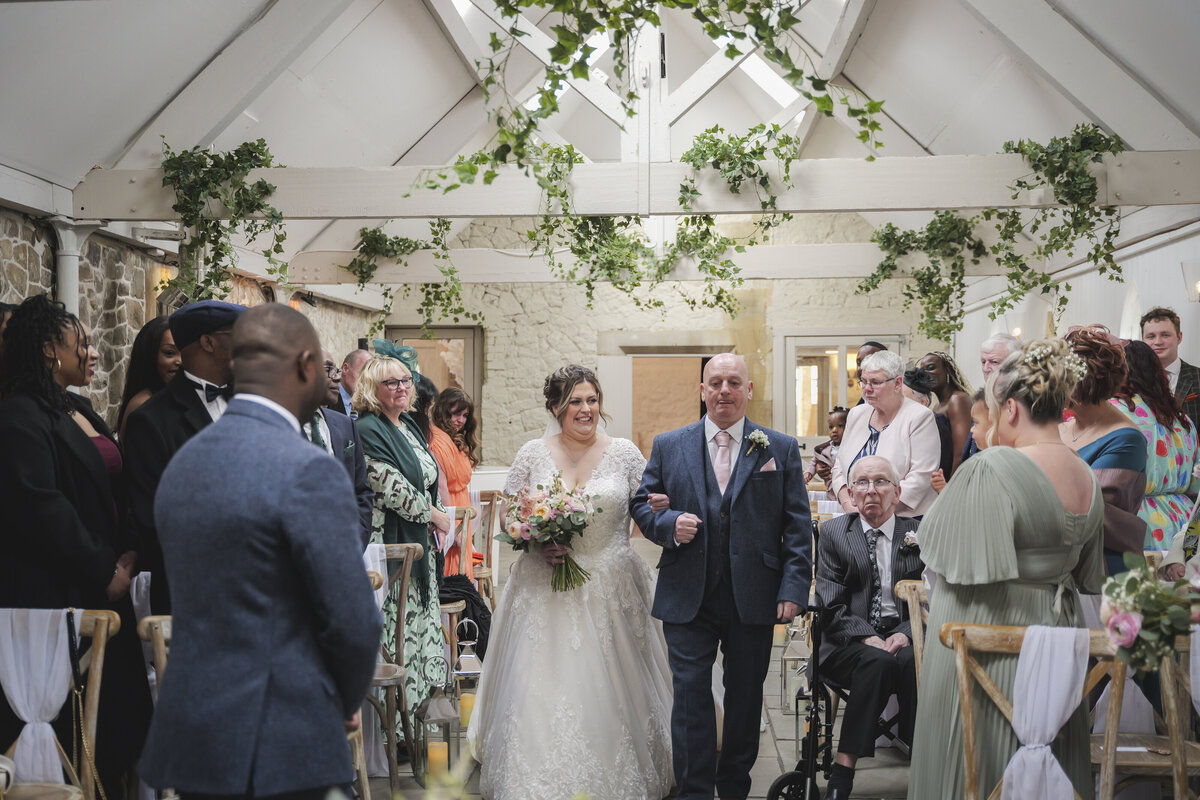 Melissa walking down the aisle