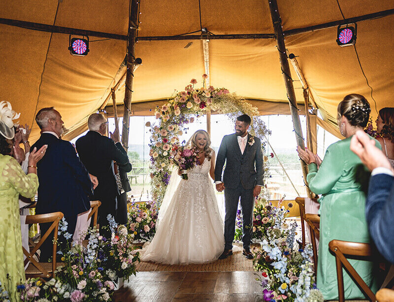 Wedding couple in bell tent 175