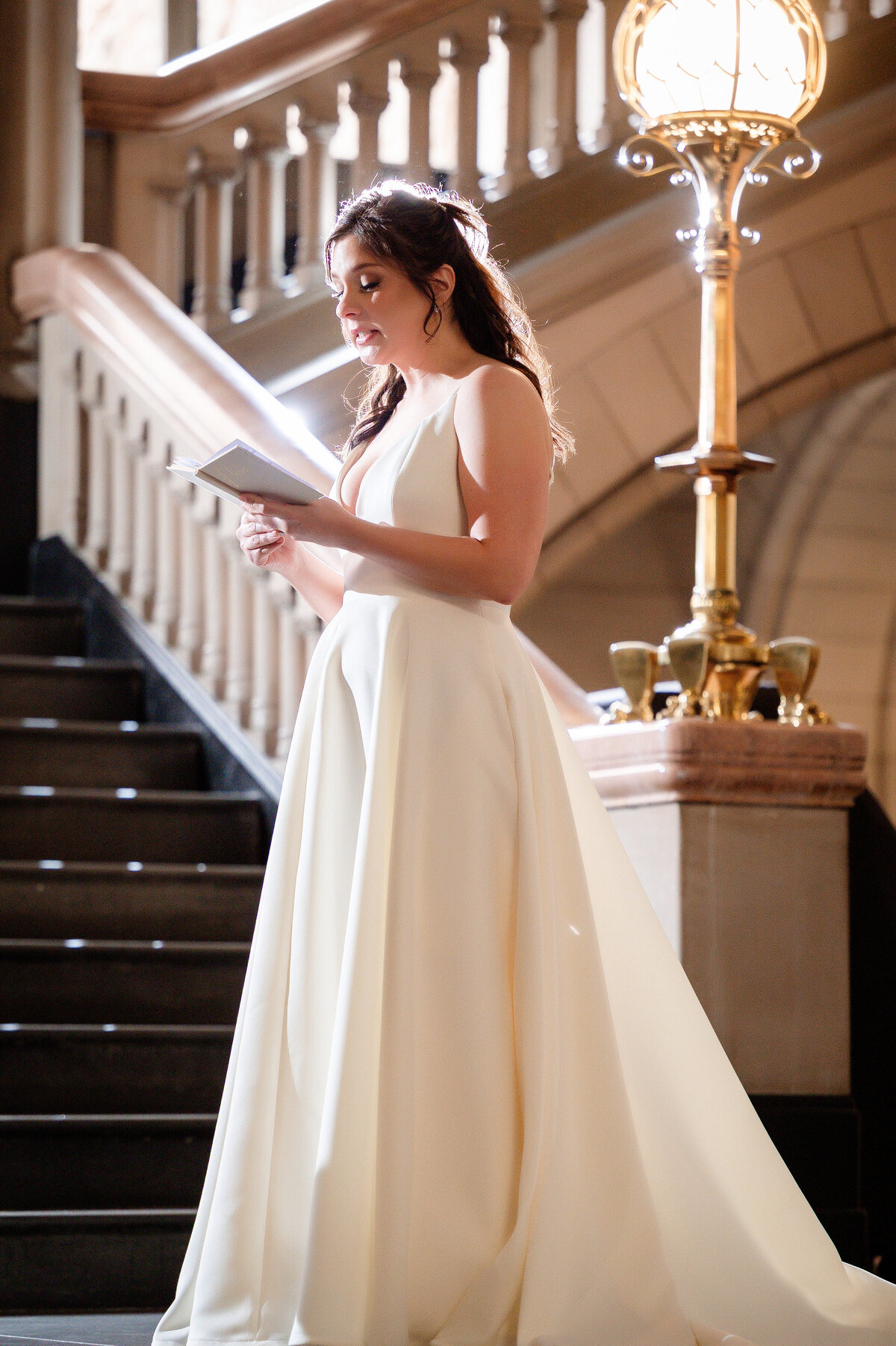 bride reading her wedding vows at micro wedding allegheny county courthouse pittsburgh