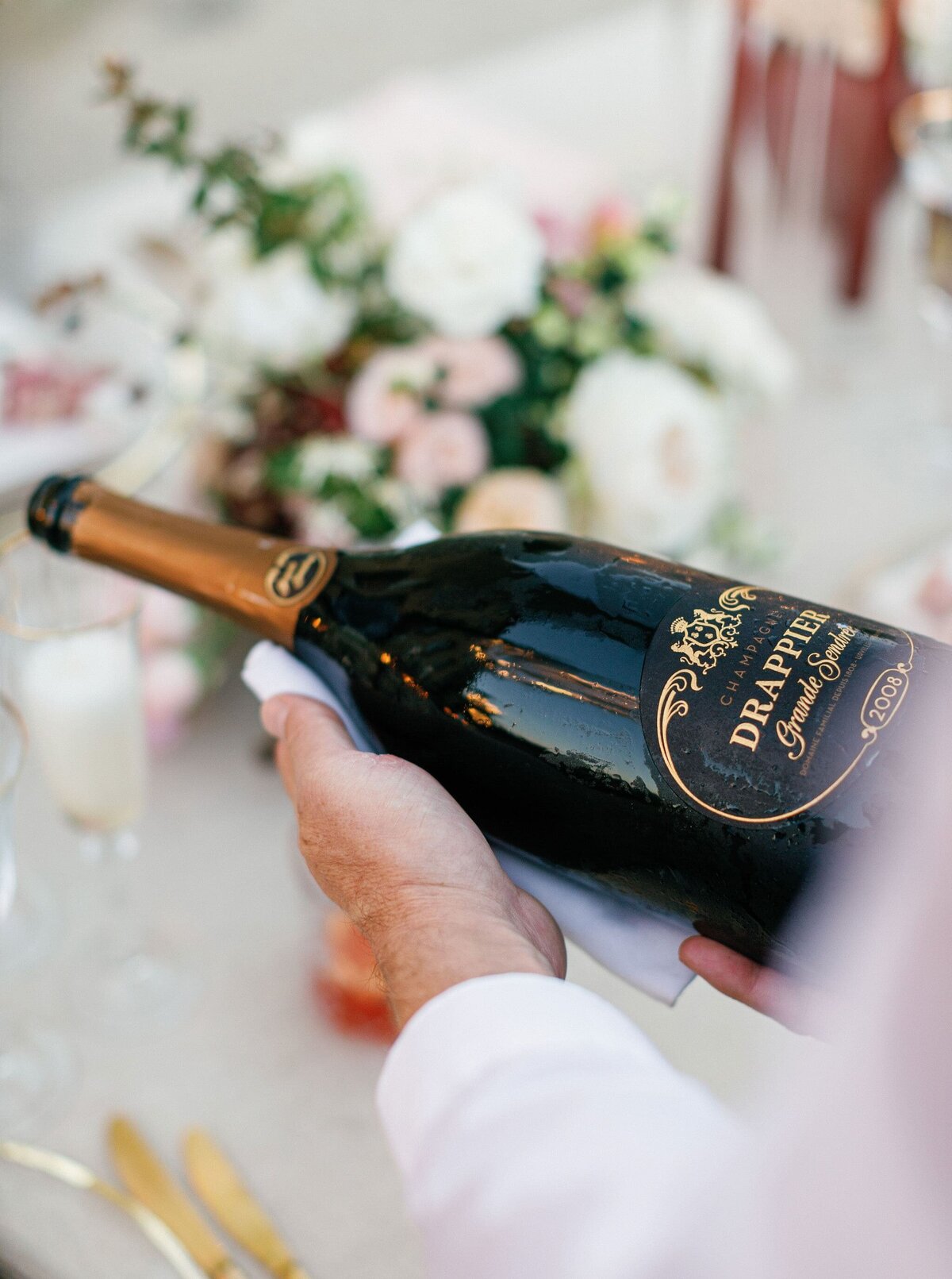 Waiter-serving-Drappier-champagne