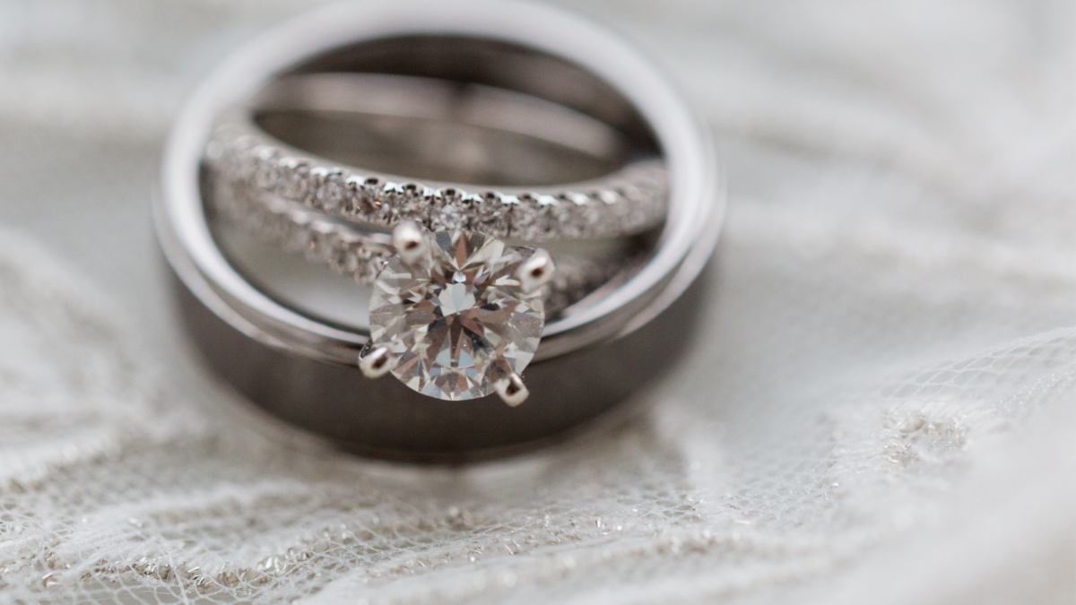 Wedding rings close up during mini wedding ceremony