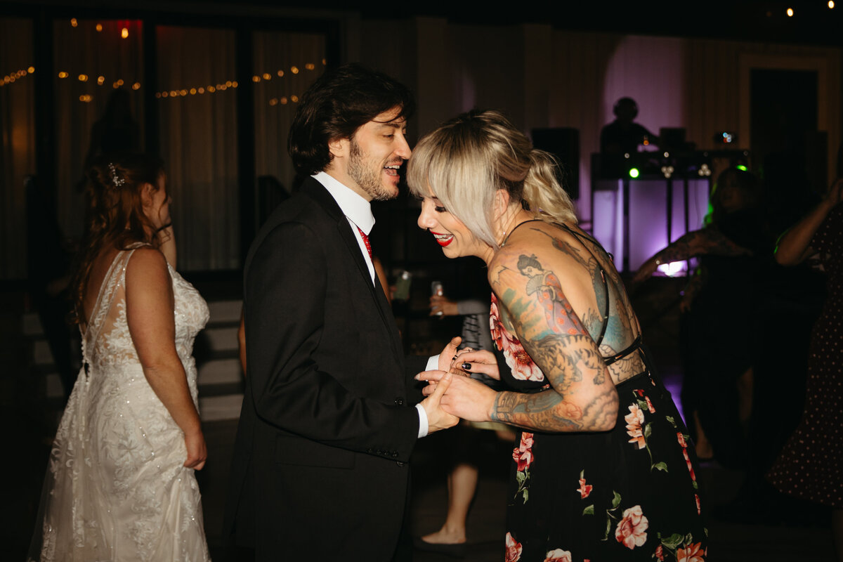wedding guests dance at wedding
