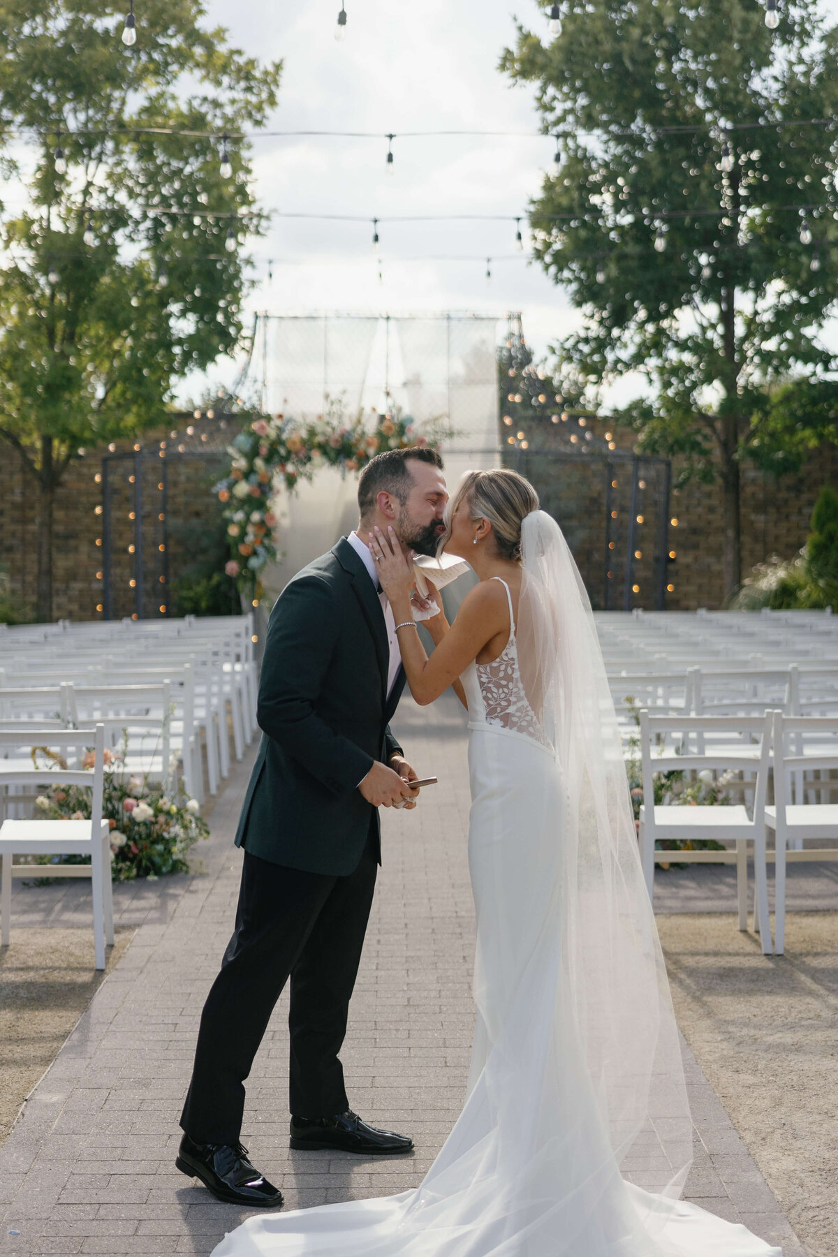 Wedding Day Portraits Couple Kissing
