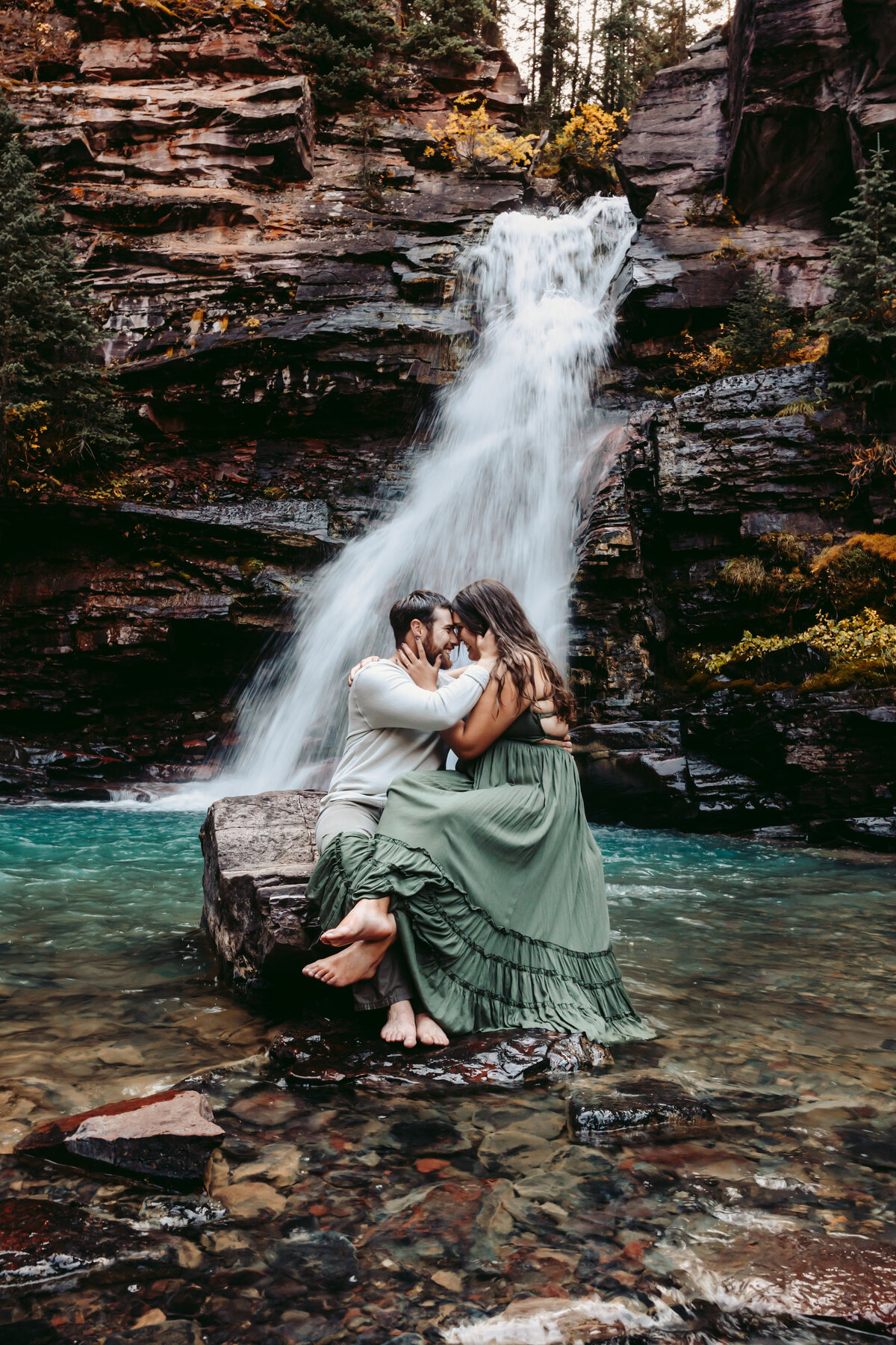 Ouray engagement session near a waterfall.