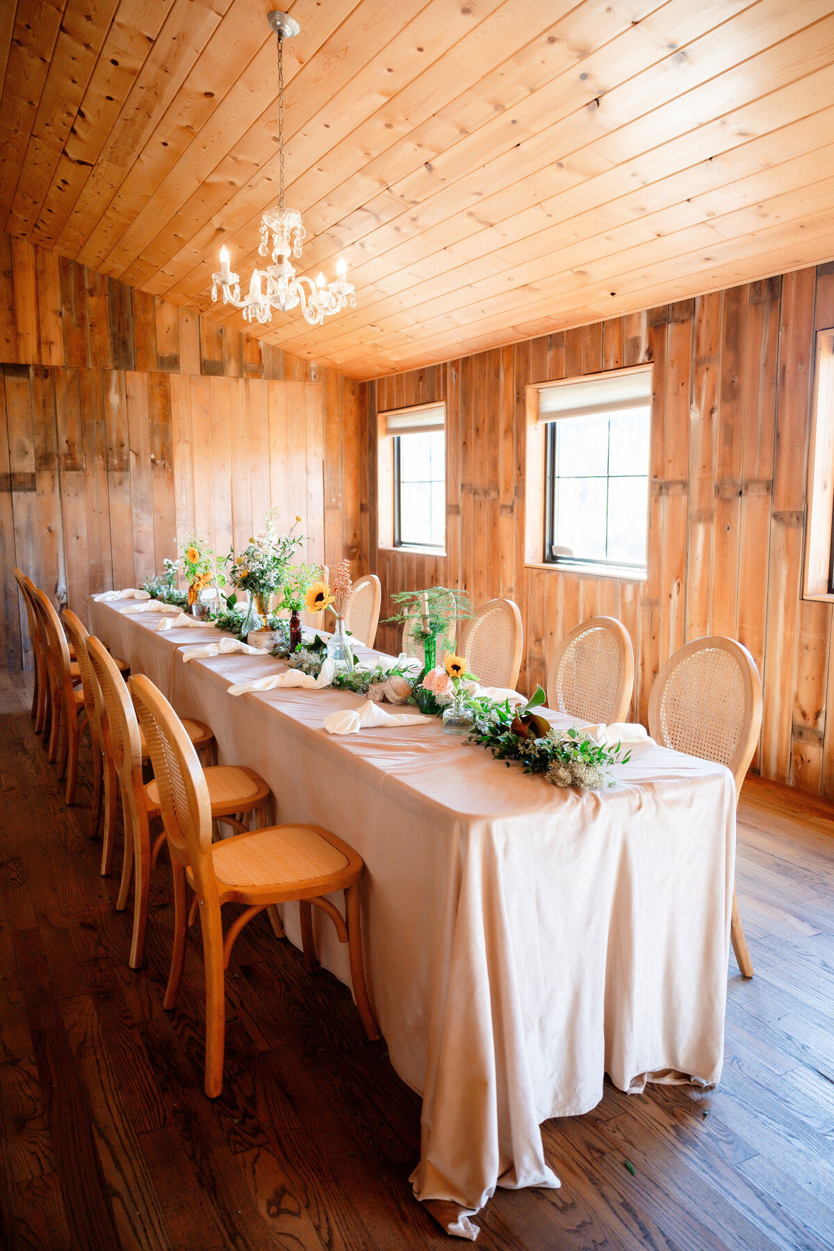 long tables in the barn at shady elms farm