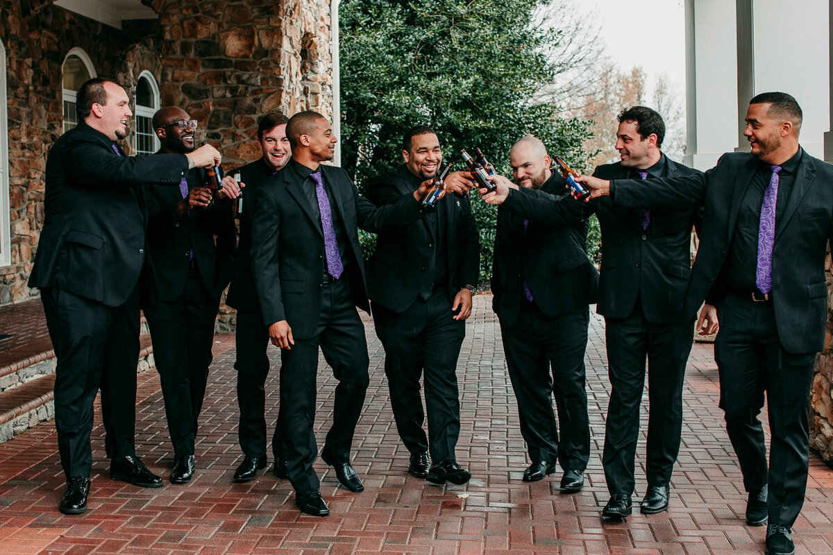 Groomsmen pumping each other up