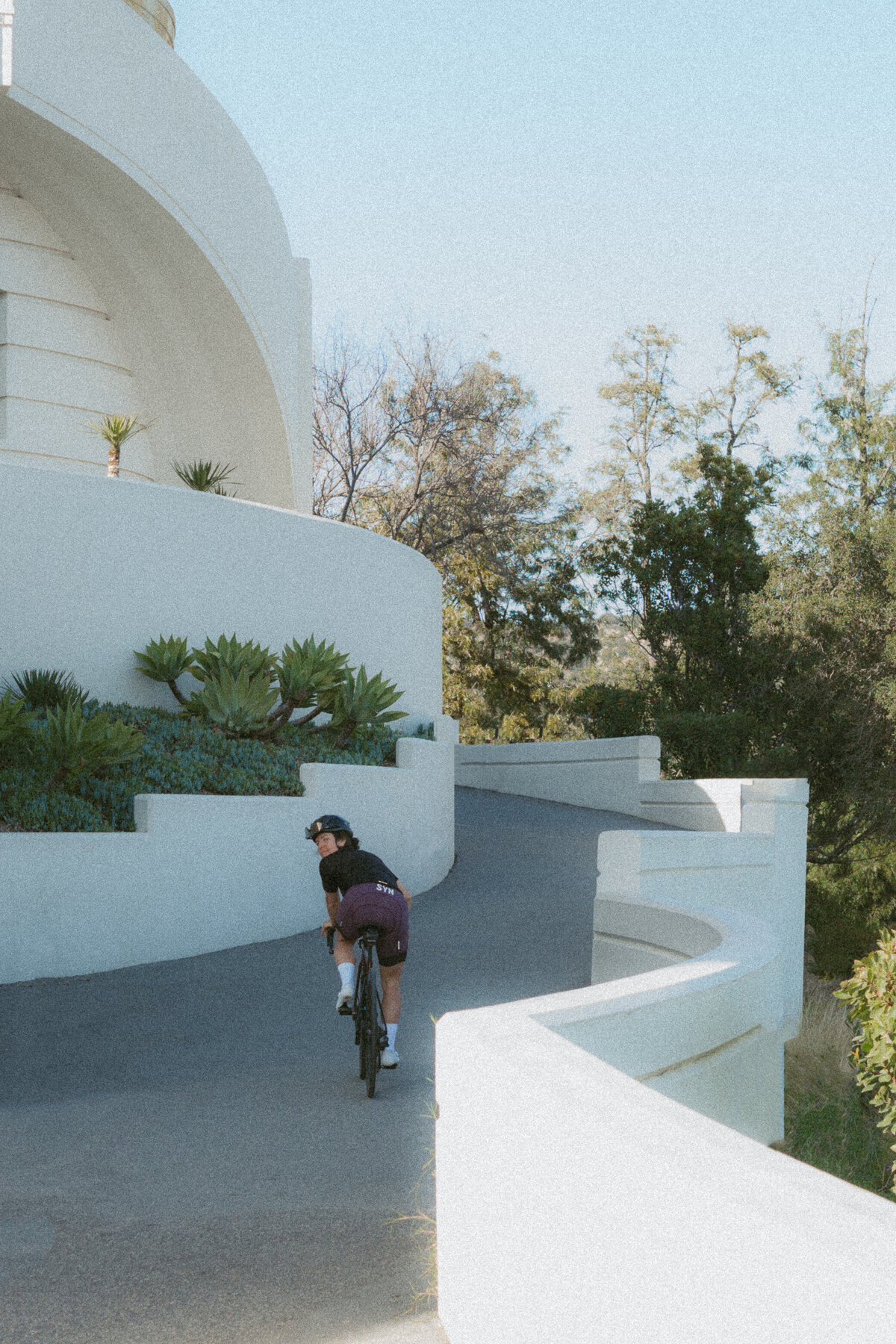 Female Cyclist Climbing at Griffith Observatory