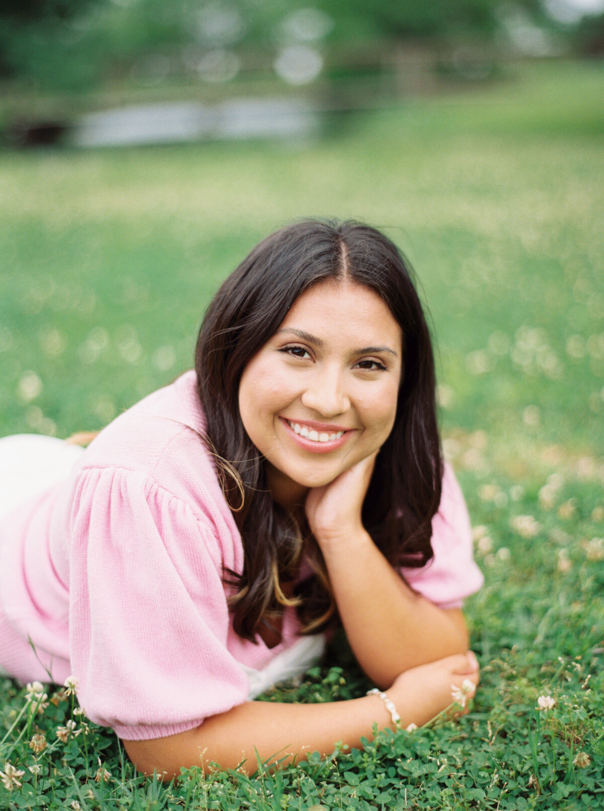 A classic senior portrait amid the historic beauty and floral landscapes of Rosedown Plantation, beautifully documented on film by Morgan Alysse, Louisiana film photographer.