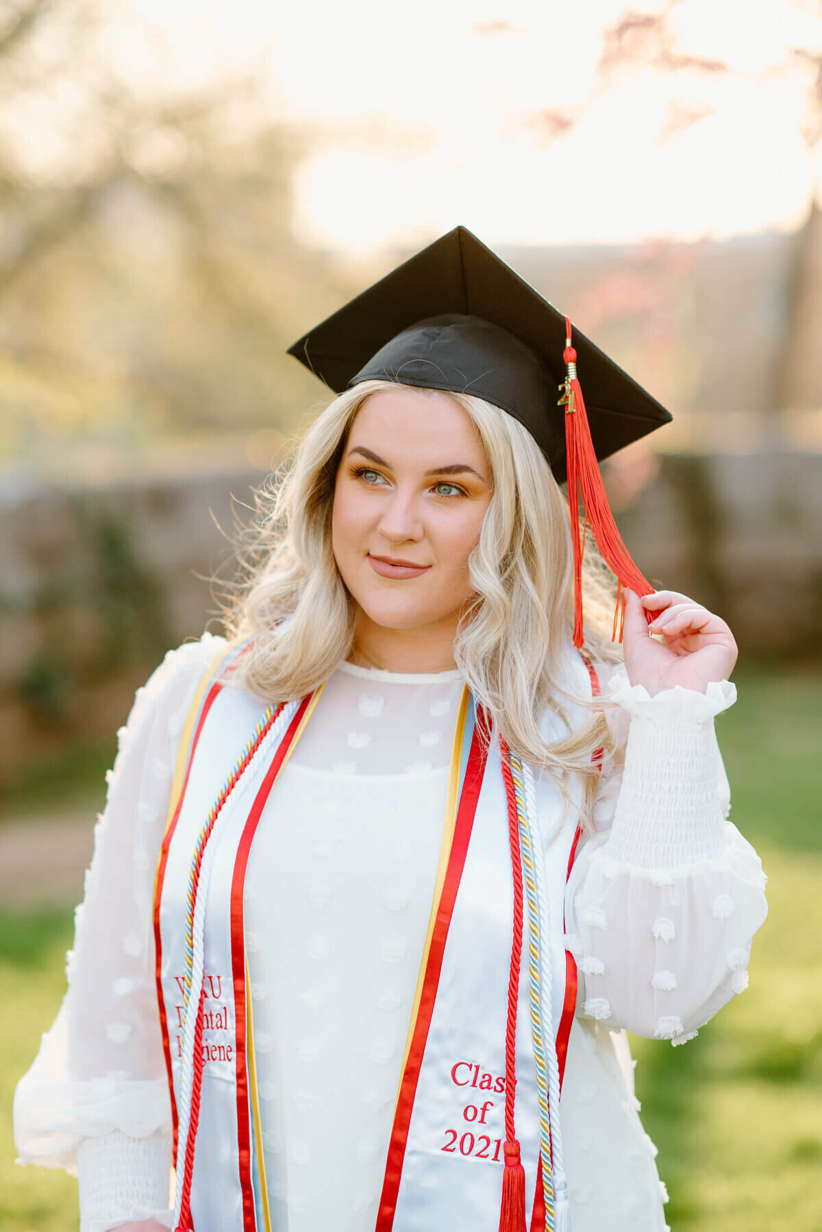 portrait of a girl wearing cap by senior photographer