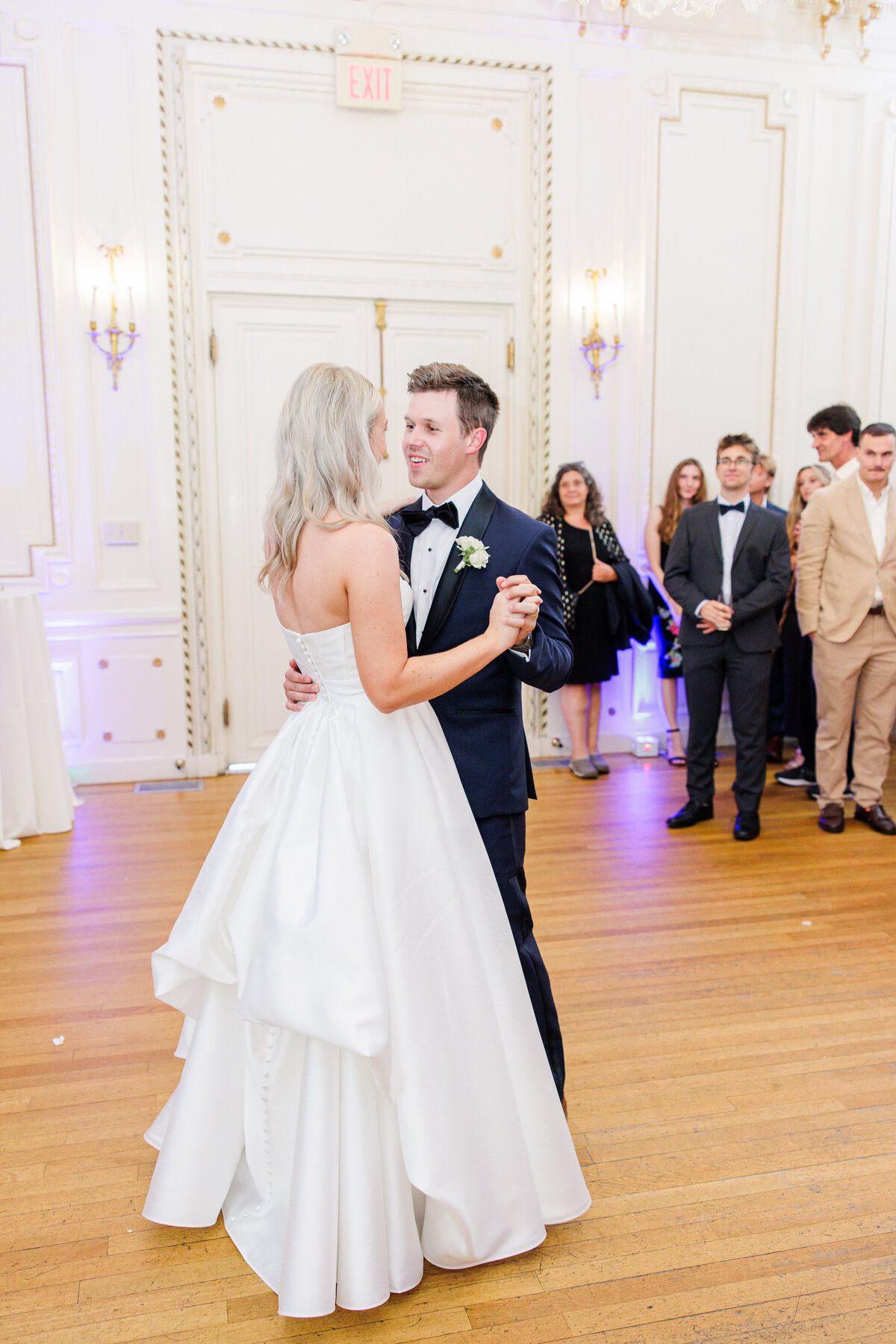 Bride and groom sharing their first dance representing candid Boston wedding photography