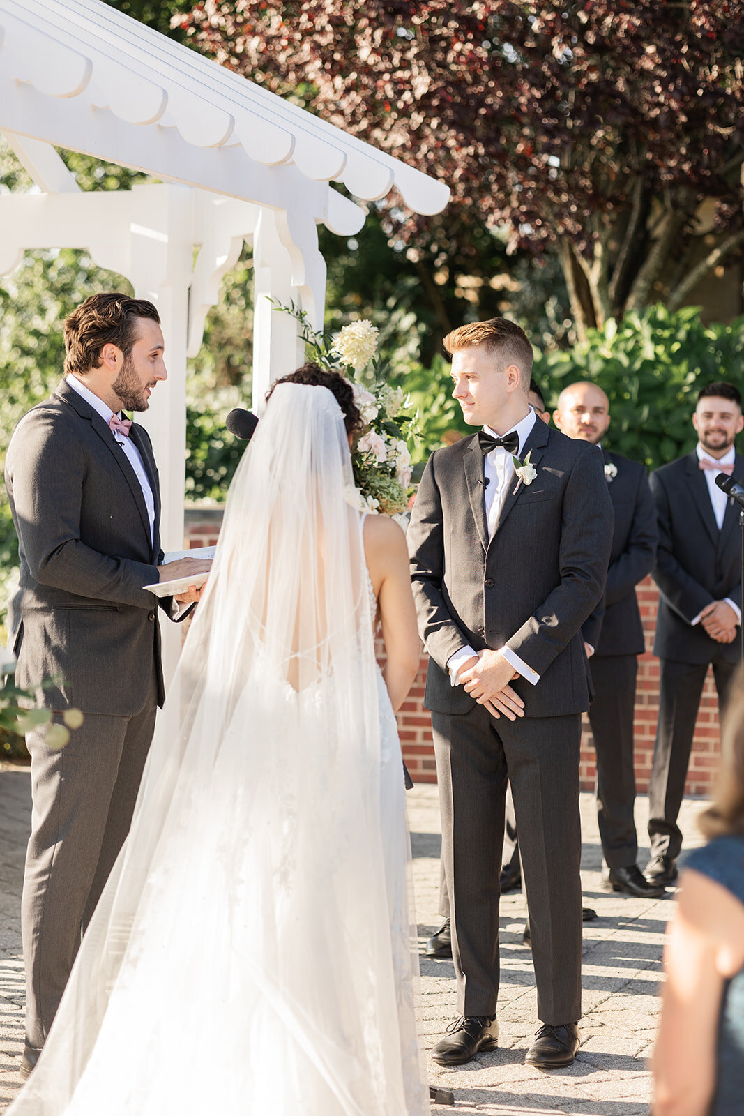 candid moments during wedding ceremony at the grandview
