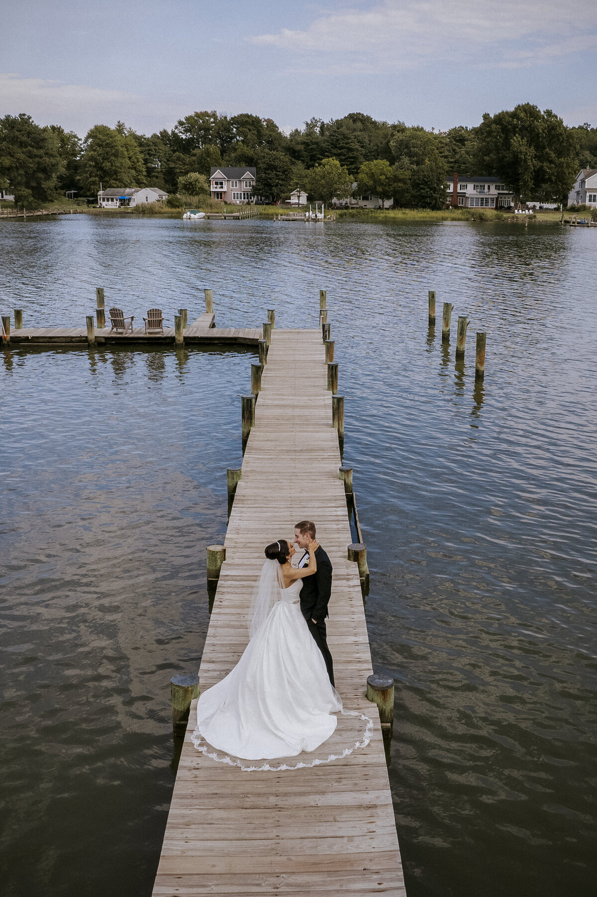 newlyweds-on-waterfront-dock