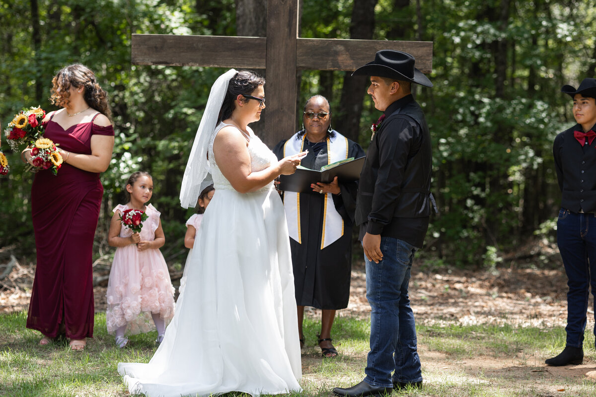 bride and groom saying vows at The Burch on 27 in Hamilton Georgia by Georgia Wedding Photographer Amanda Richardson Photography
