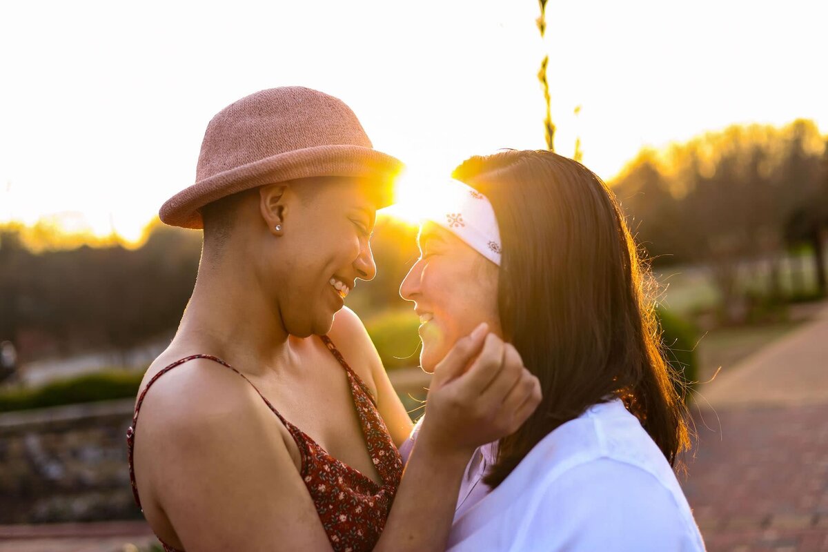 Couple embrace in sunset