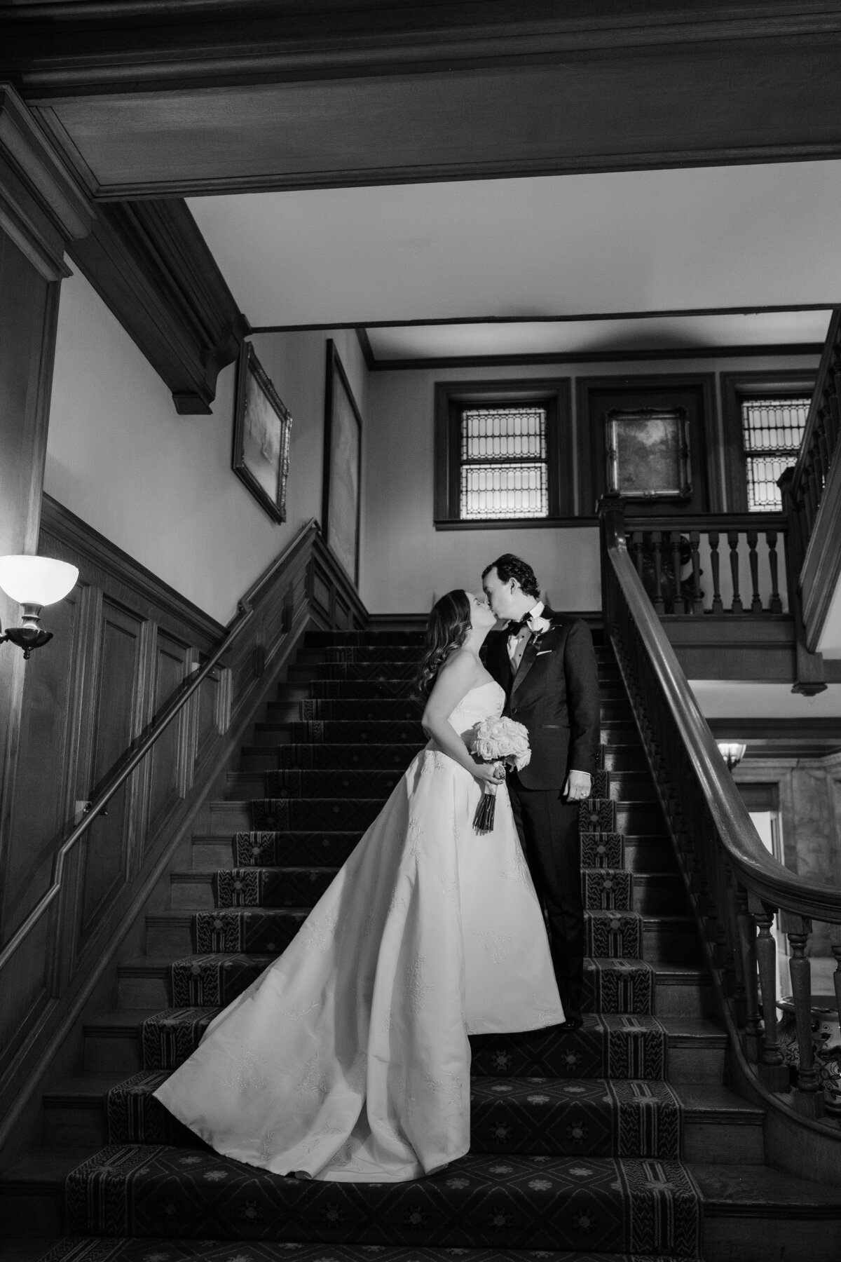 wedding photo on the staircase at duquesne club