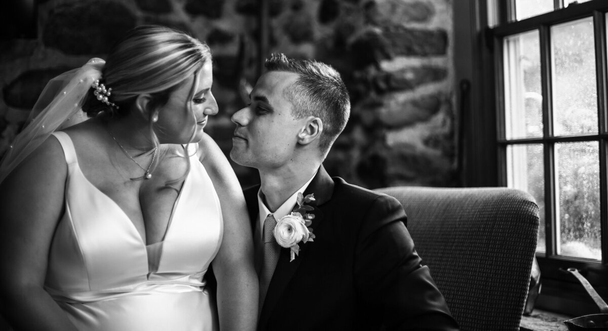 Bride and groom share first kiss at the end of their CHQ Barn wedding ceremony in Chautauqua, NY