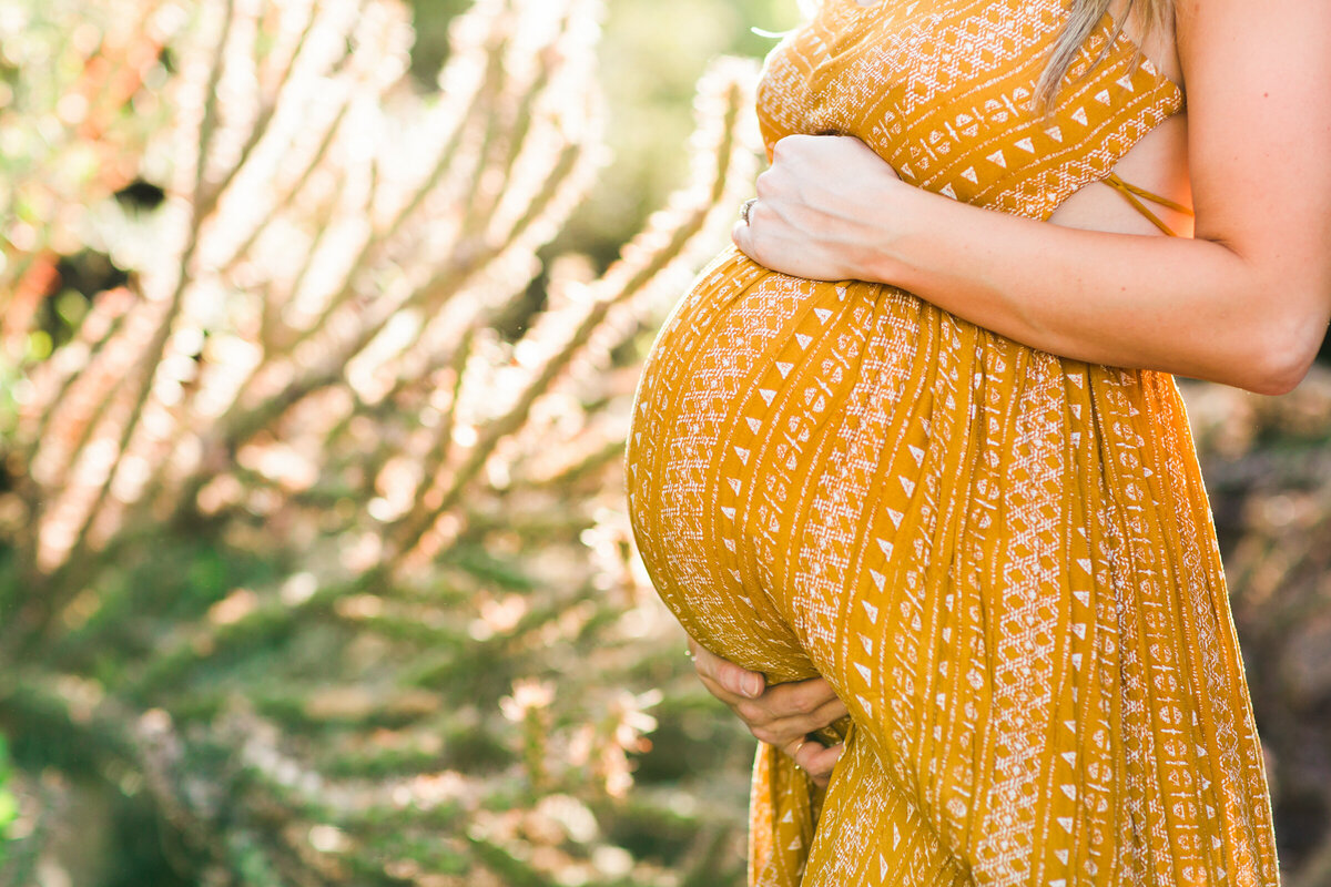 closeup baby bump in Scottsdale desert maternity photo session